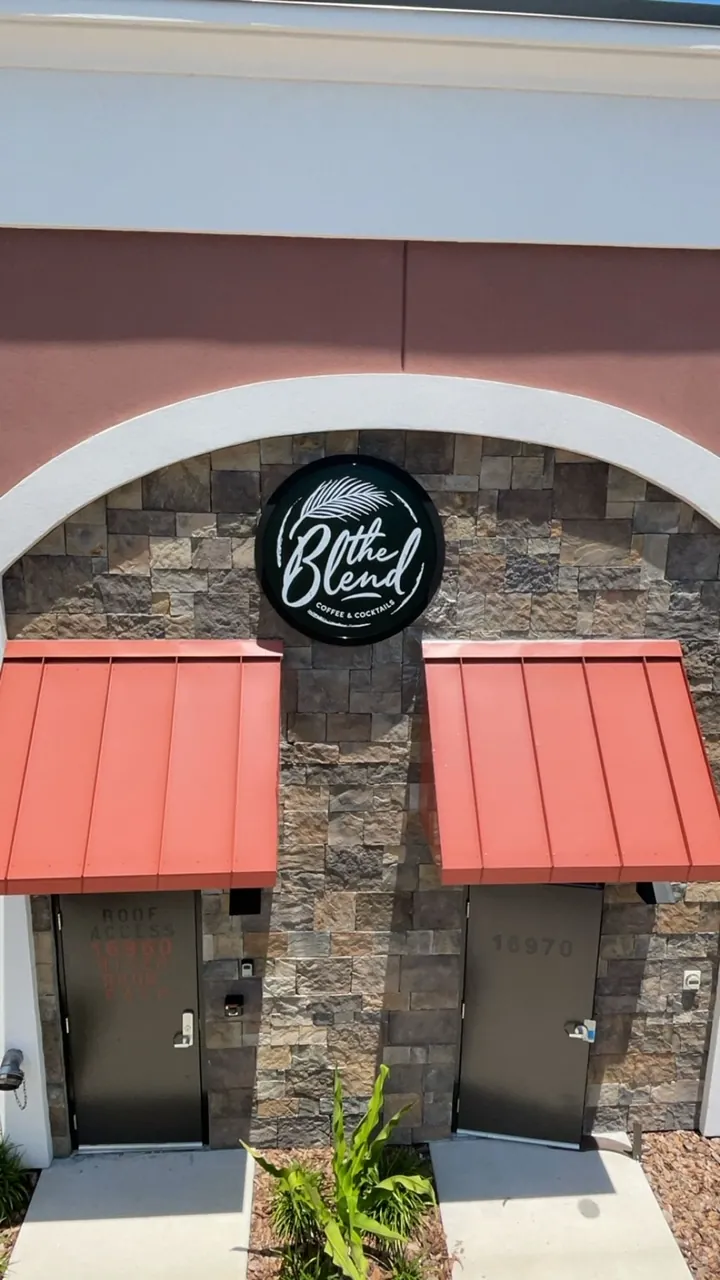 Rear entrance sign at the Bexley Coffee & Cocktails location