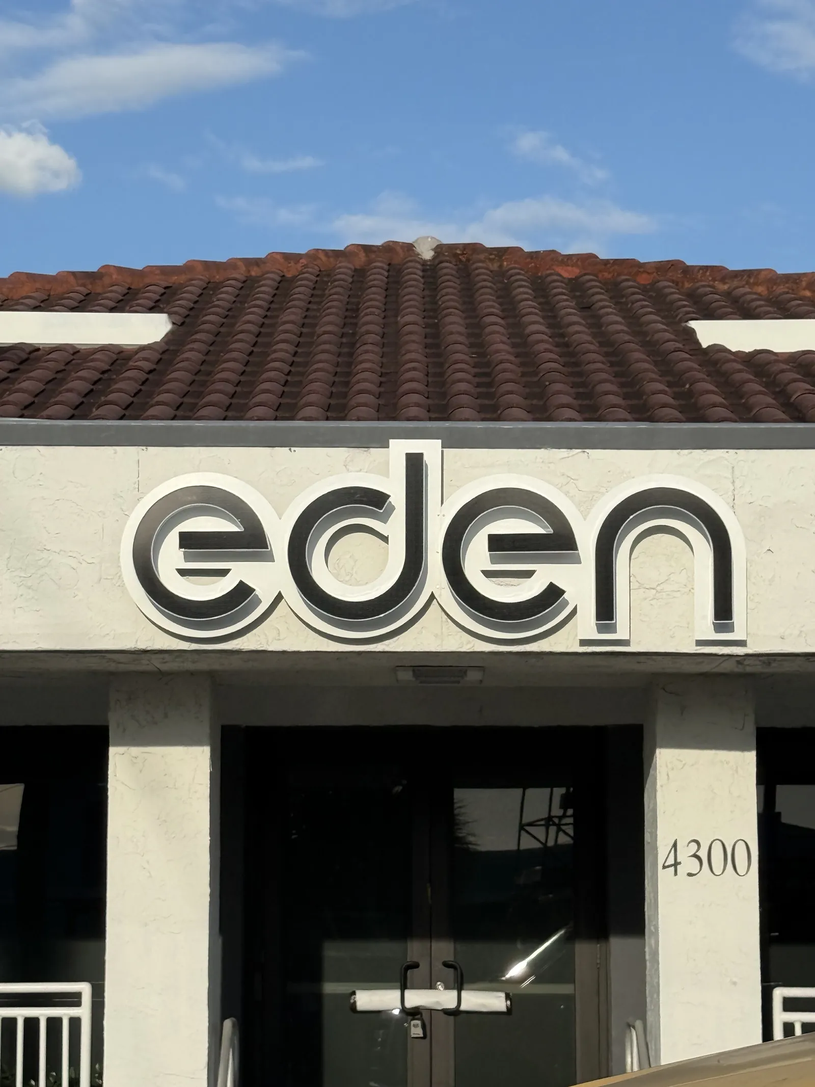 Eden dispensary channel letters on tower facade