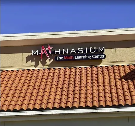 Mathnasium channel letters with red A+ logo above a tile roof in Plant City